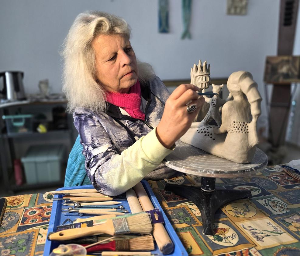 Anette working on one of the terracotta sculptures in her studio in Fuengirola.